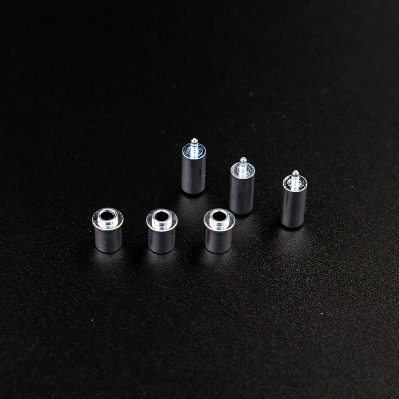 How does the use of iron cores in the operating mechanisms of low-voltage electrical appliances improve mechanical strength?